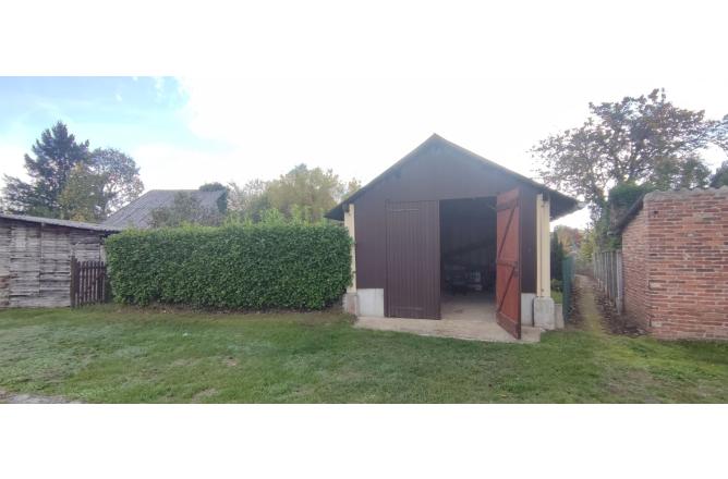 Maison 4 chambres avec jardin et garage - E