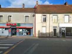 ENSEMBLE DE 2 BATIMENTS ACCOLES ET JARDIN ATTENANT