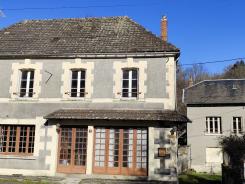 Propriété de 2 maisons , Bord de rivière et grand terrain